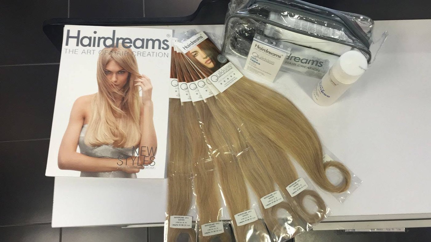 Hairdreams extension bundles ready on the counter.