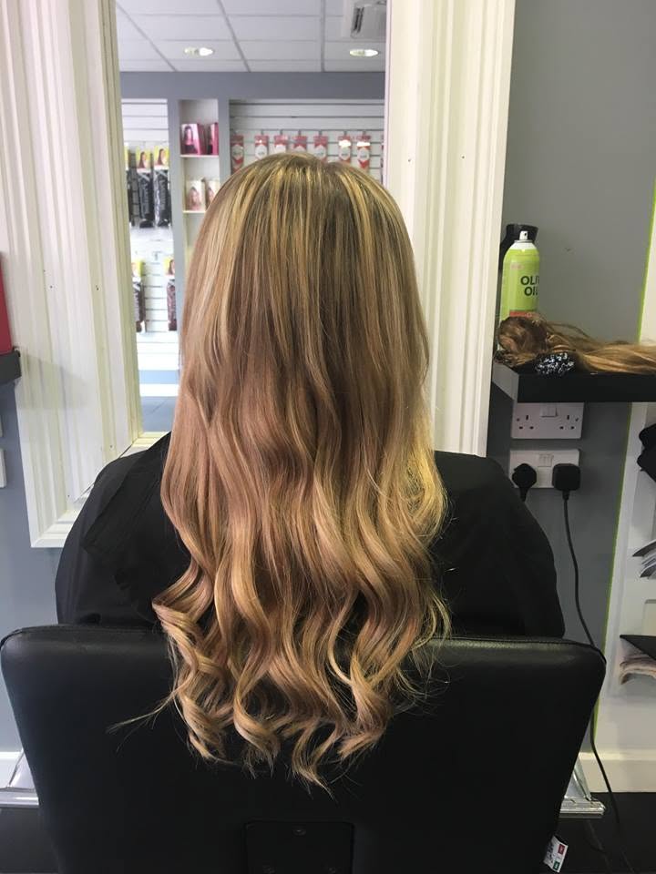 Long blonde waves photographed in the Dare to Dream salon.